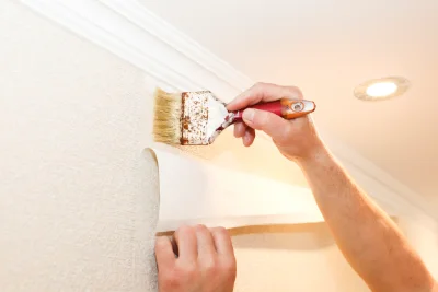 Pose de papier peint à Auriat — revêtements muraux et toiles de verre